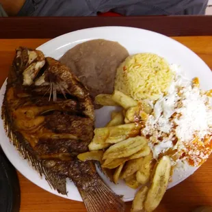 Fried fish with tajadas and honduran cheese