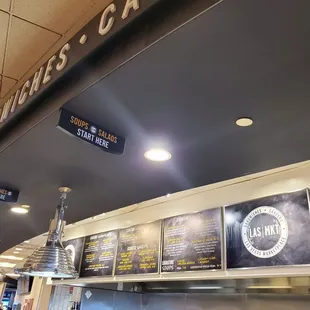 menus on the wall of a restaurant