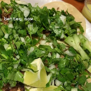 tacos de asada with salsa verde, cebolla, &amp; cilantro.