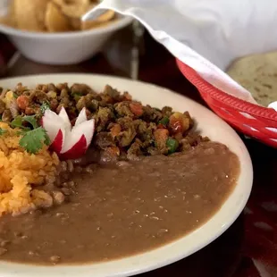 Fajita plate with three homemade tortillas. Authentic, full of flavor, and very delicious!