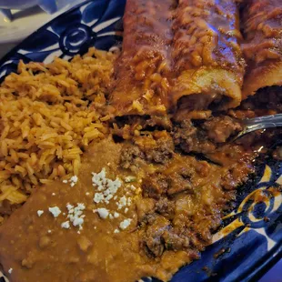 Enchiladas with red sauce and ground beef