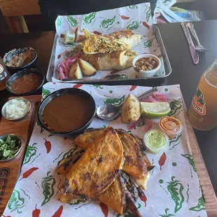 birria tacos and their street burrito