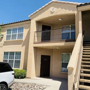 This complex was built in 2004 and is 20 years old. There are stairs to the 2nd floor, but no elevator