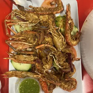 a plate of grilled shrimp