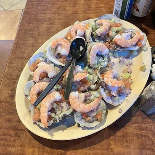 a plate of shrimp and clamsel