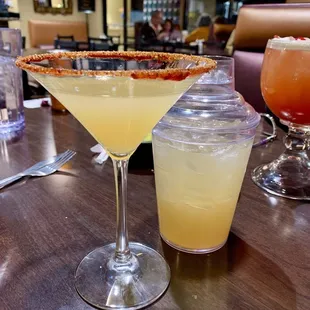 two margaritas on a table