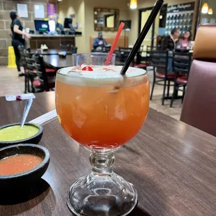 a drink in a glass with a straw