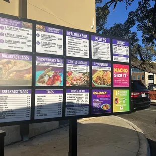 a restaurant menu displayed on a sign