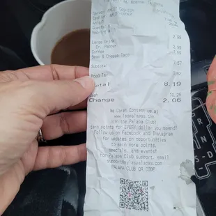 Receipt for two drinks and one taco. Average pricing.