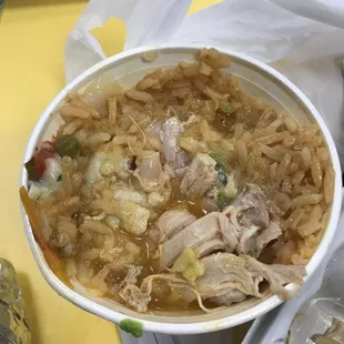 a bowl of chicken and rice soup