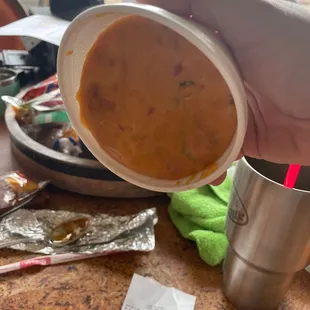 Hard congealed brown queso