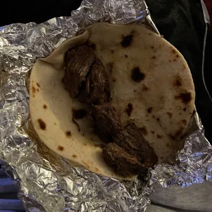 $4 for this? Plain fajita taco? This is terrible. Not worth $4!