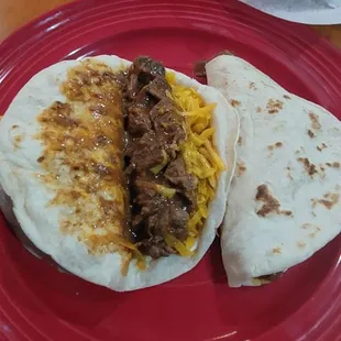 Carne guisada with cheese