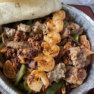 Chicken, steak, shrimp and  Fajitas Tropicales