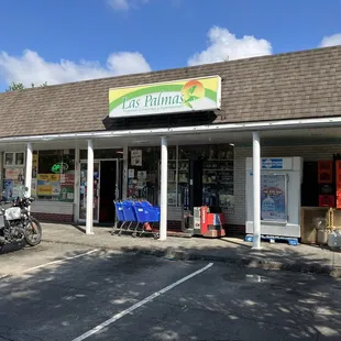 a motorcycle parked in front of a store