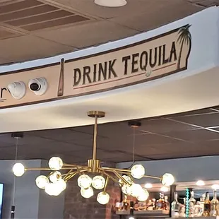 This is the sign above the bar area.  Photo taken June 12, 2021.