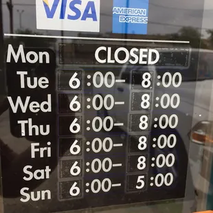 Hours and partial shot of methods of payment.