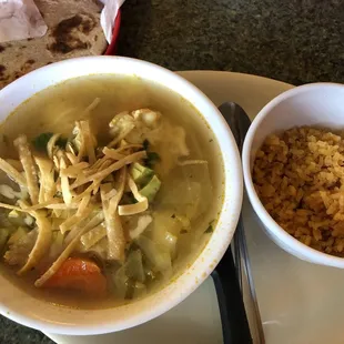 a bowl of soup and a bowl of rice