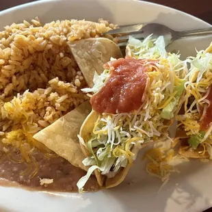 #19 tacos dorados with rice and beans, I ordered chicken