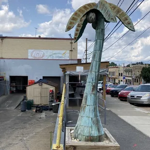 a sculpture of a palm tree