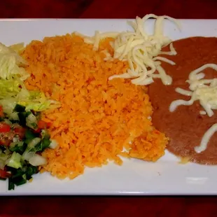 Sides of rice, frijoles, pico, &amp; greens