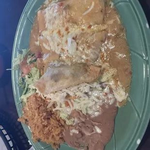 Combination plate #1 2 enchiladas de queso &amp; 1 taco with rice and beans.