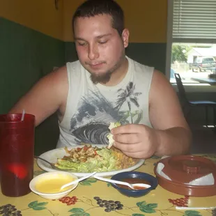 goes down good after a hard days work!!! here w/ another one of his favorites (the chicken fajita special)