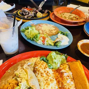 -Fajitas Half-pund of tender beef or chicken fajitas sautéed with grilled onions  -Chile con Queso