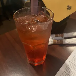 a drink in a tall glass