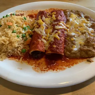Carnitas enchiladas with red sauce