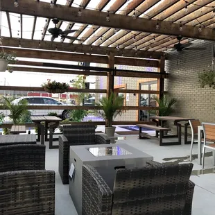 a patio with wicker furniture