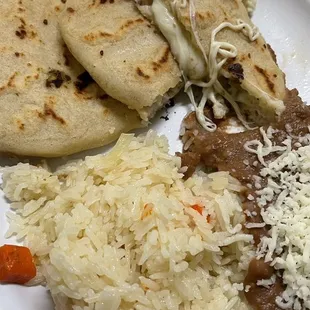 Vegetarian - jalapeño cheese pupusas with El Salvadoran rice and beans.