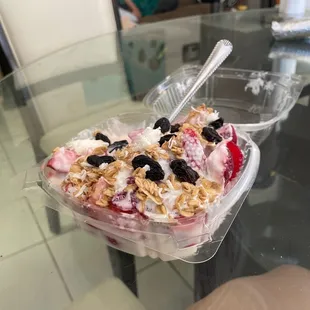 a bowl of fruit and yogurt