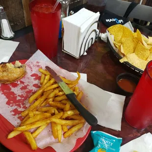 Kids plate: Cheeseburger with fries, and fruit snack packet, Chips and salsa for our table.