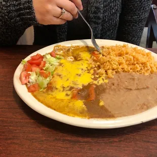 Cheese enchiladas lunch special $6.50  Chicken or beef add a $1