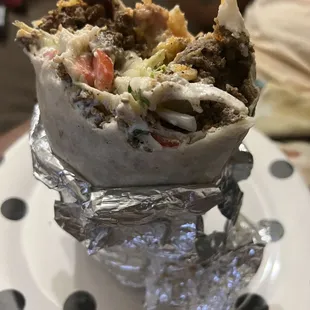 Super Steak burrito ($13.95) unwrapped and massive