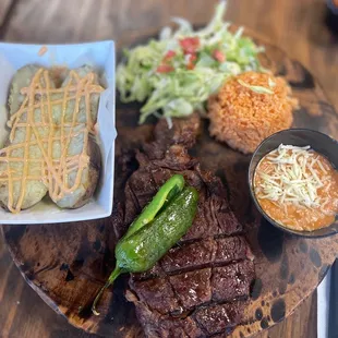 Ribeye steak... I wished they would've cooked to what I ordered. I ordered M.Rare and I received Well done. But had good flavor.