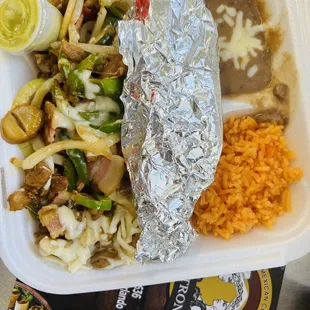 a meal in a styrofoam container