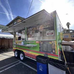 a food truck parked in a parking lot