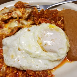 Chilaquiles with a fried egg on top yummmmm