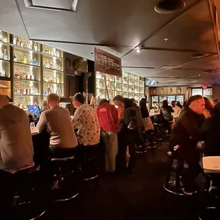 people sitting at a bar