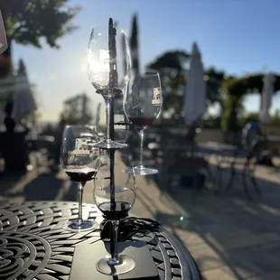 three wine glasses on a table