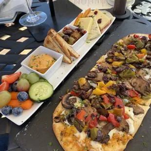 Veggie flatbread and charcuterie plate