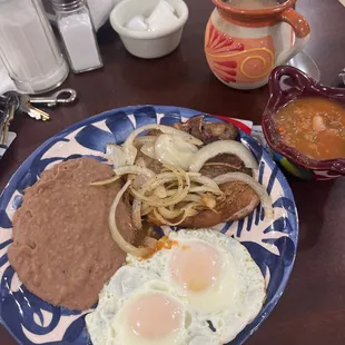 Huevos rancheros with pork chop