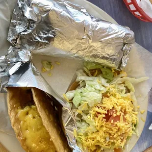 a plate of tacos and chips