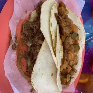 Papas Rancheras large taco on corn tortillas. Large bean a la plancha with grilled onions.