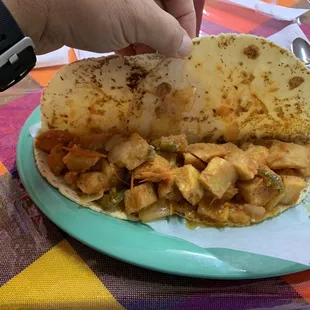 Papas Rancheros large taco on corn