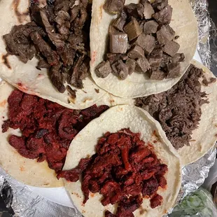 2 Al Pastor, Asada, lengua, Cabeza. All delicious! Best Taco Stand I've been to so far!