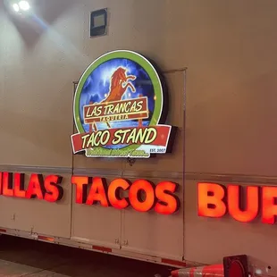 a neon sign for a restaurant