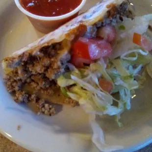 Las Trancas&apos; taco. A warmed on the grill tortilla with ground beef. For a ground beef taco it was actually quite good!